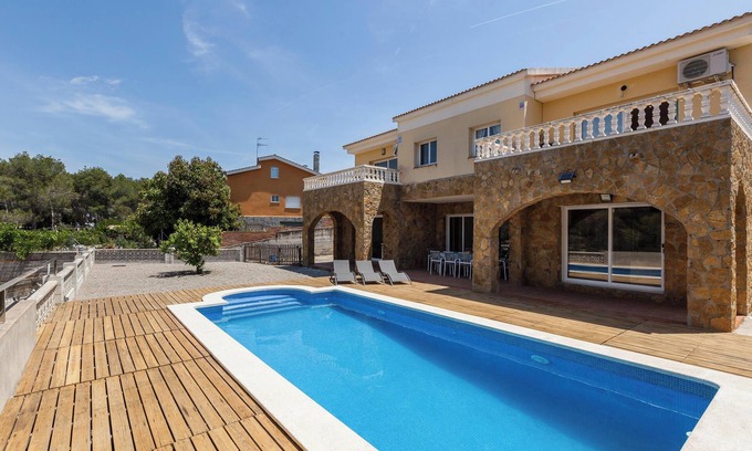 Olivella Maison | Maison de vacances "Villallop" avec vue sur les montagnes, piscine et Wi-Fi.