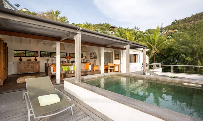 Pointe Milou Villa | Vues majestueuses, emplacement idéal, grande piscine et bassin profond, salons privés