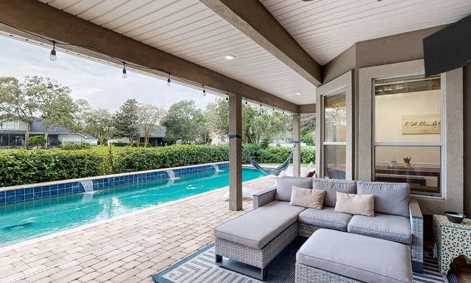 Fleming Island Maison | Picture-perfect getaway with saltwater pool, outdoor bar, grill & soaking tub