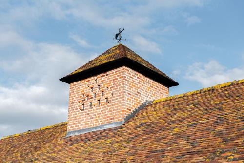 Pontesbury Maison | Pigeon House - Unique Barn with private garden, hot tub and wood burner