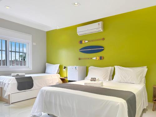 Enseada Appartement | Piscina Churrasqueira Suíte 200m do Mar AC