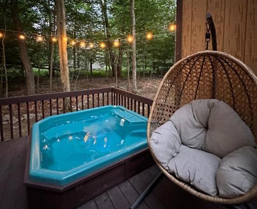Gouldsboro Maison | Pocono Hideout Family Home with Hot Tub Deck Sunroom Pool Big Bass Lake Larsen Lake Gouldsboro Clifton Township