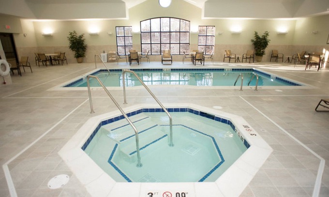 North Wales Copropriété | Suite pour malentendants avec petit-déjeuner quotidien gratuit | Accès au gymnase 24h / 24, piscine + bain à remous partagé