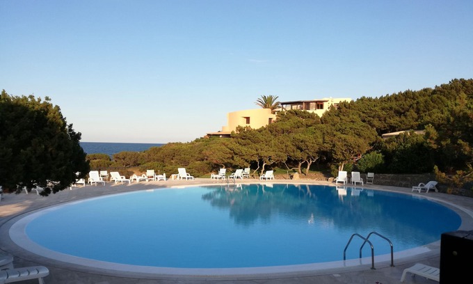 Porto Cervo Appartement | Porto Cervo, a stone's throw from the sea in a green residence with an elegant swimming pool