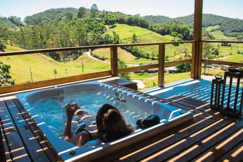 Aguas Mornas Maison | Prana Chalé com Hidromassagem - Águas Mornas - SC