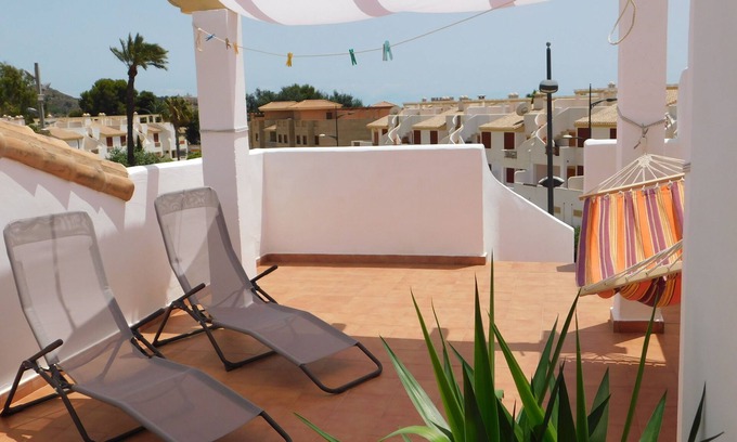 Portman Appartement | Dernier étage, terrasse de toit privée, A / C, wifi gratuit, piscine, garage, vue, plage à pied