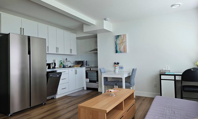 Burke Mountain Maison | Private south-facing suite with a full bathroom and fully equipped kitchen.