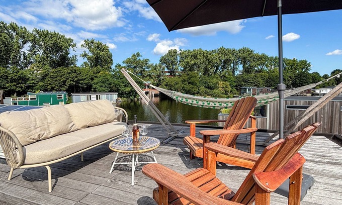 Stadionbuurt Location De Bateaux | Private watervilla 60m² nearby Amsterdam centre+ rooftop terrace