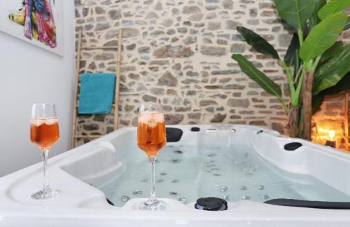 Centre ville - Urbanistes Appartement | Profitez d'une douce nuit avec jacuzzi