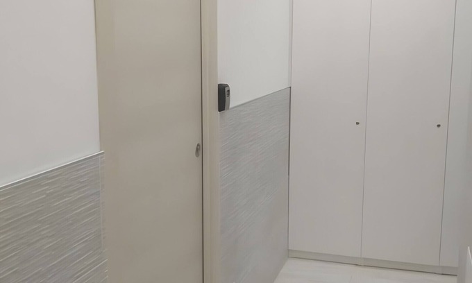 Quarto Cagnino Appartement | Quadruple Room with Wi-Fi and Air Conditioning