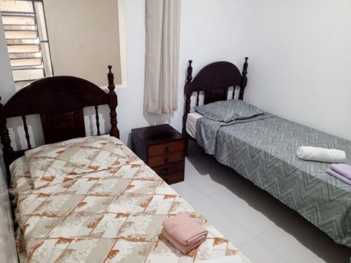 Souza Maison | Quarto 2 camas de Solteiro