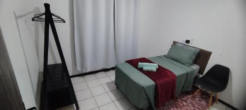 Costa e Silva Maison | Quarto em casa de família
