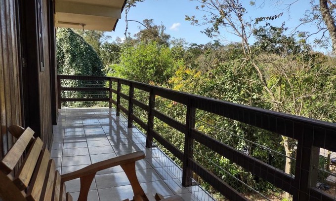 Praia Grande Appartement | Quarto Ipê Rosa