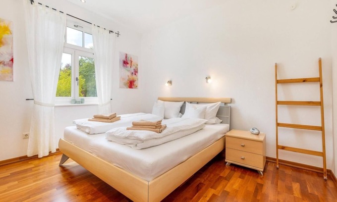 Zudar Appartement | Rügenbrise am Wasser - Fewo EG