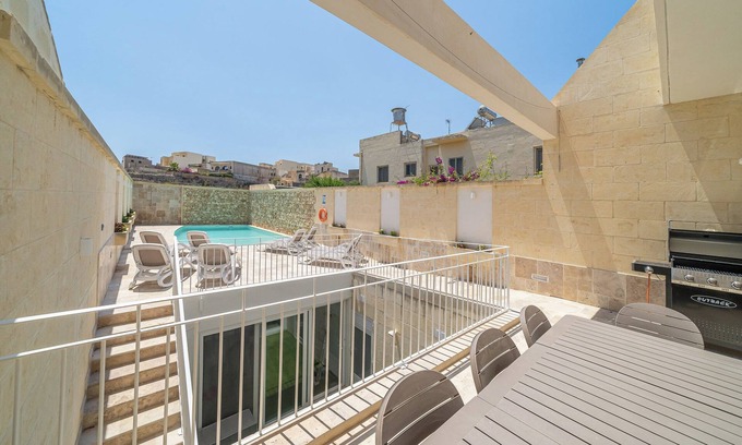 Munxar Villa | Recently built in vernacular style, Ta’ Spiru is spread over three floors