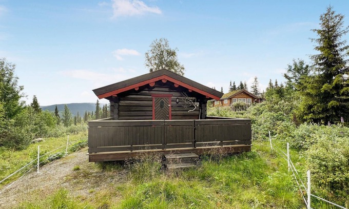 Nordre Land Maison | Recharge your batteries in this cozy log cabin near the Synna River.