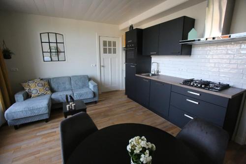 Sint Nicolaasga Appartement | Recreatieappartement BoerdeRijlst - De Winkel