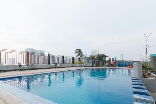 Palanan Hôtel | RedDoorz @ Melbourne Suites Makati