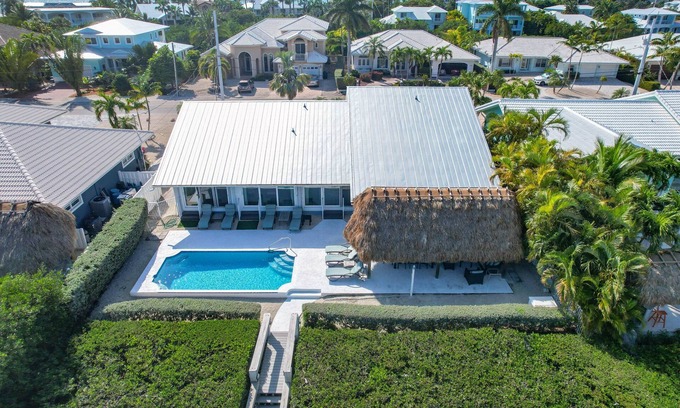 Coury Maison | Reel 'Em In: Your Beautiful KCB Retreat, Private Pool, Dock, Tiki Hut, Cabana Club & Dog-Friendly!
