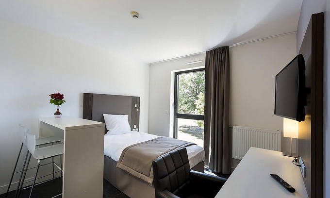 Dijon Hôtel | Refreshing Stay with Free Offsite Parking! Pet Friendly Property!