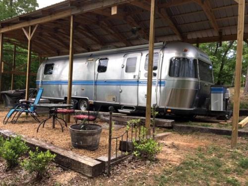 Crane Hill Maison | Refurbished 1999 Airstream Rental for Glamping in Alabama