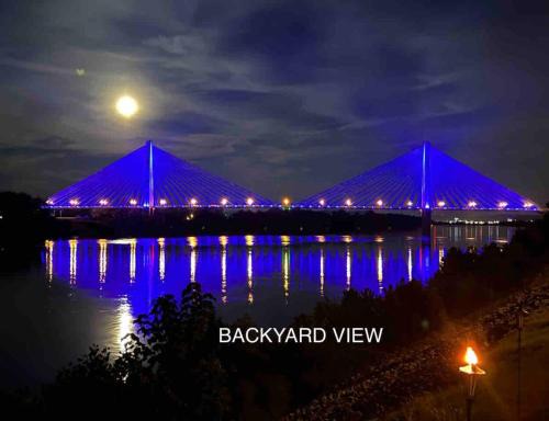 Russell Maison | Relax at Rivertime with a Bridge and River view, plus a HotTub