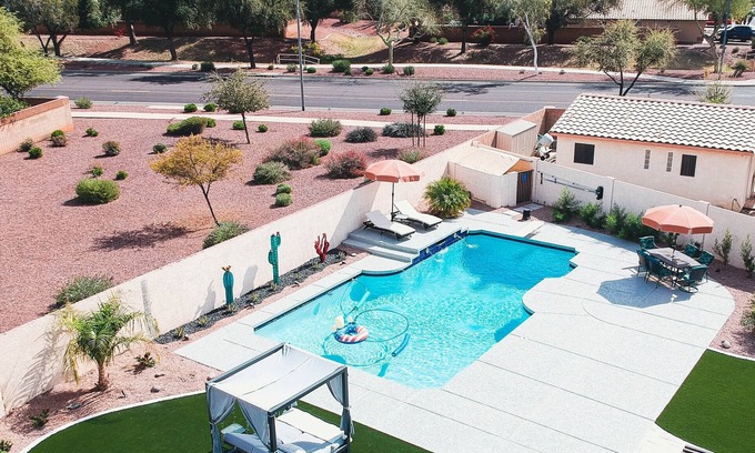 Avondale Maison | Relax in private heated hot tub or just bask in the sun by the pool.