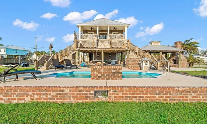 Shoreline Park Maison | Relaxing Waterfront Getaway with Pool, Boat Dock, and Ice House next door.