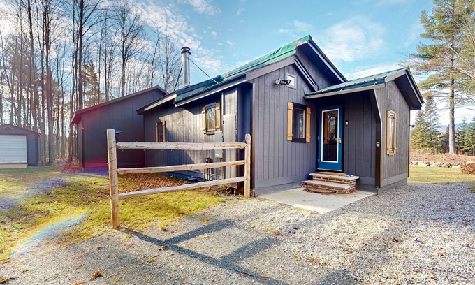 North Troy Cabine | Renovated historic cabin with mountain views, lake access, & electric fireplace