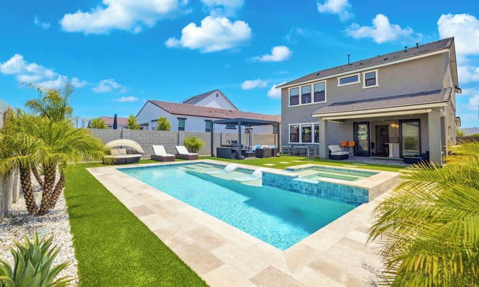 San Tan Valley Maison | Resort style 4-bedroom house, heated pool/hot tub, fitness room in Queen Creek