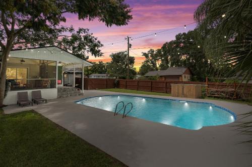 Forest City Maison | Resort-style home with a Heated Pool and a Huge Gated Yard