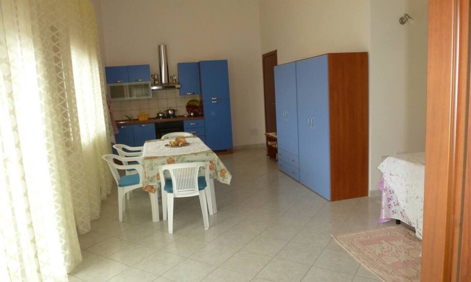 Iglesias Historic Centre Appartement | Rilassati nella Nostra Suite Magnolia: Un Ambiente Familiare Vicino al Centro