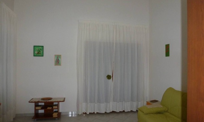 Iglesias Historic Centre Appartement | Rilassati nella Nostra Suite Rosa: Un Ambiente Familiare Vicino al Centro