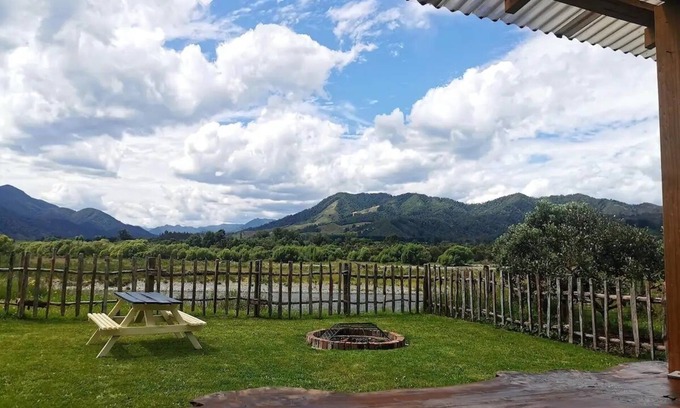 Murchison Maison | Riverside Bedford Bus with stunning valley views.