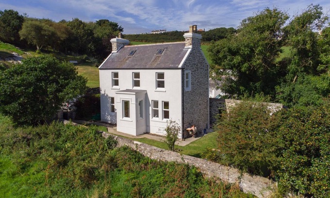 Cregneish Cottage | Riverside cottage is situated in a wonderful location near Port St Mary, Isle of Man. Nestled in a p
