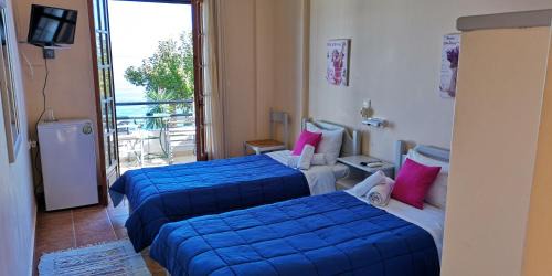 Poulithra Hôtel | romanza rooms