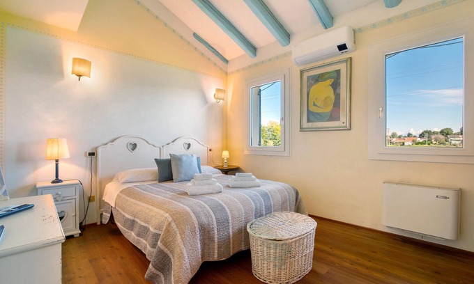 Mirano Appartement | Chambre 'Azzurra' avec jardin partagé, Wi-Fi et climatisation