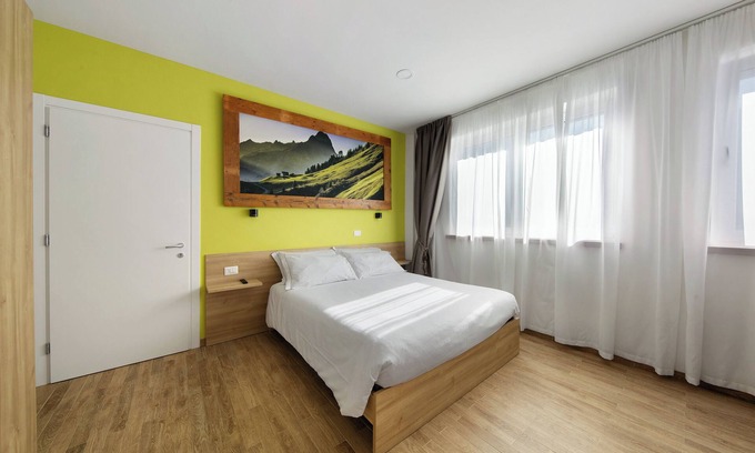 Domegge di Cadore Appartement | Chambre 'Camera S Verde Bagno Esterno Privat' avec vue sur lac, terrasse partagée et Wi-Fi