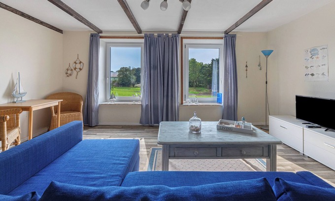 Barlt Appartement | Chambre "Das Möwennest" avec terrasse et jardin partagés