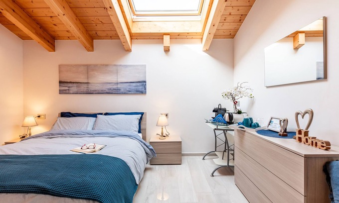 Musso Appartement | Chambre 'Elena' avec piscine partagée, jardin partagé et Wi-Fi