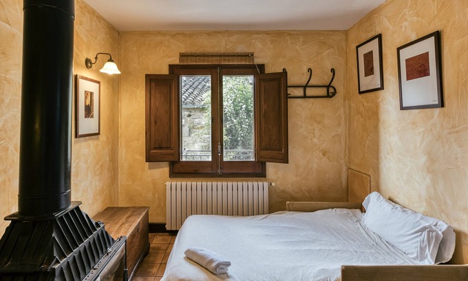 Pujals dels Pagesos Appartement | Chambre "Garbi" avec piscine partagée, Wi-Fi et climatisation