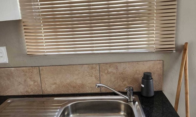 Govan Mbeki Maison | Room in B&B - Khutsong Apartmentss