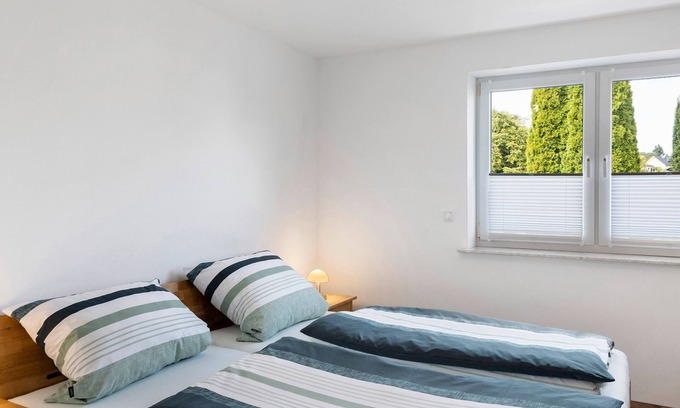 Angersbach Appartement | Chambre 'Ruhiges Zimmer 2' avec Terrasse partagée, Wi-Fi et Climatisation
