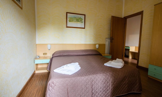 Ronchi Appartement | Chambre 'Stanza Doppia' avec jardin partagé, Wi-Fi et climatisation