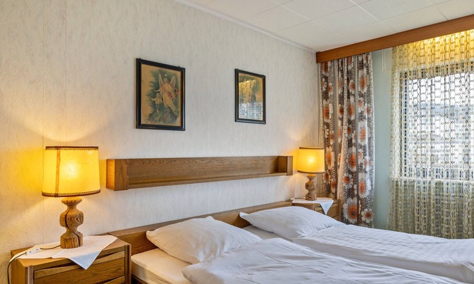 Reinhardshausen Appartement | Room 'Wollmert' with Shared Terrace, Shared Garden and Balcony