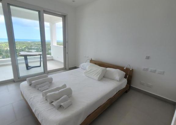 Las Terrenas Maison | Rooms with shared bathroom in villa with infinity pool and seaview