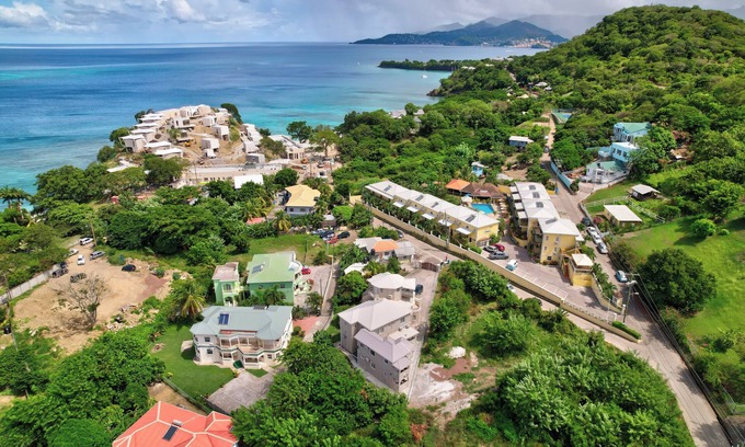 Morne Rouge Appartement | Roomy [1,001 sq ft] two bedroom Unit, steps away from white sand beach.