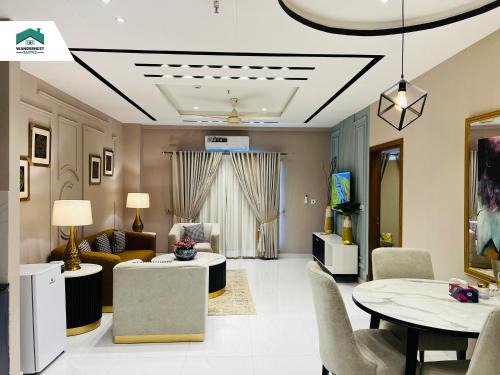 Bahria Town Appartement | Ruby - Chic & Luxury WanderNest Suite at B3 Heights with Gym in Bahria Town Ph-8