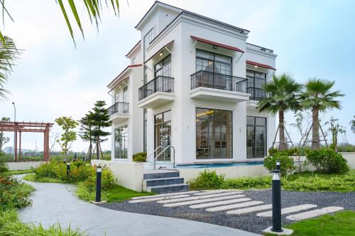 Quan Do Son Lit Et Petit-Déjeuner | Ruby Tree Golf Villas