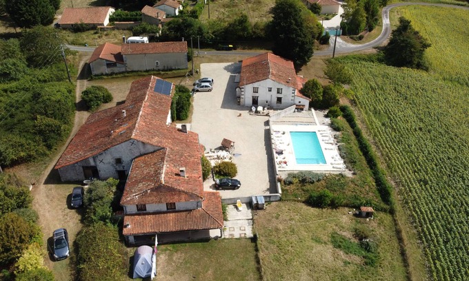 Boisne-la-Tude Maison | Rural retreat for 8 with amazing view, shared large pool and games barn